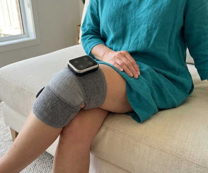 Customer photo of the Mendable Knee wrap on the lounge